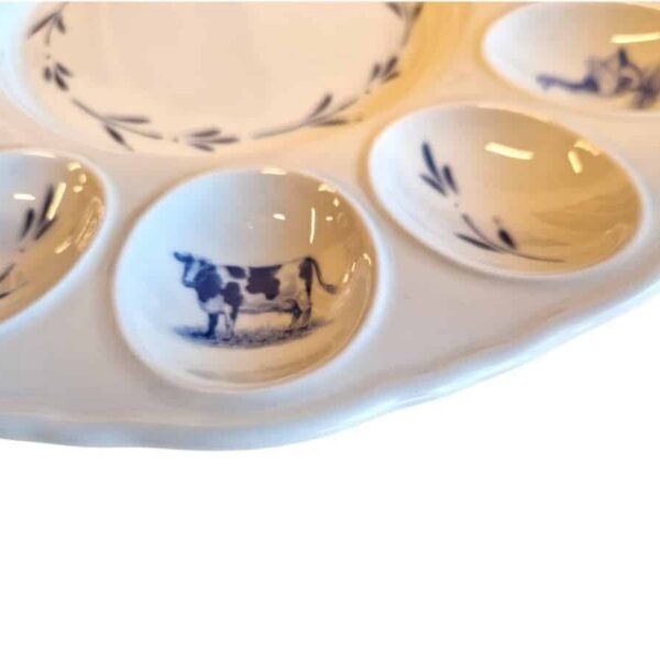 This patterned egg plate is a timeless and elegant serving piece that brings both practicality and visual beauty to your table.